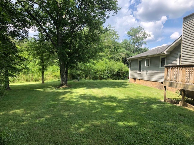 2441 Rally Hill Road Columbia, TN 38401 - Photo 3 of 14 a view of a house with a backyard