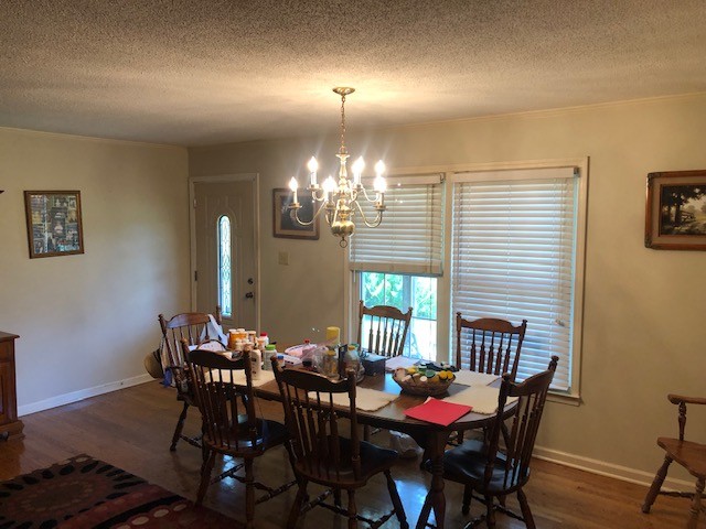 2441 Rally Hill Road Columbia, TN 38401 - Photo 6 of 14 a view of a dining room with furniture and chandelier