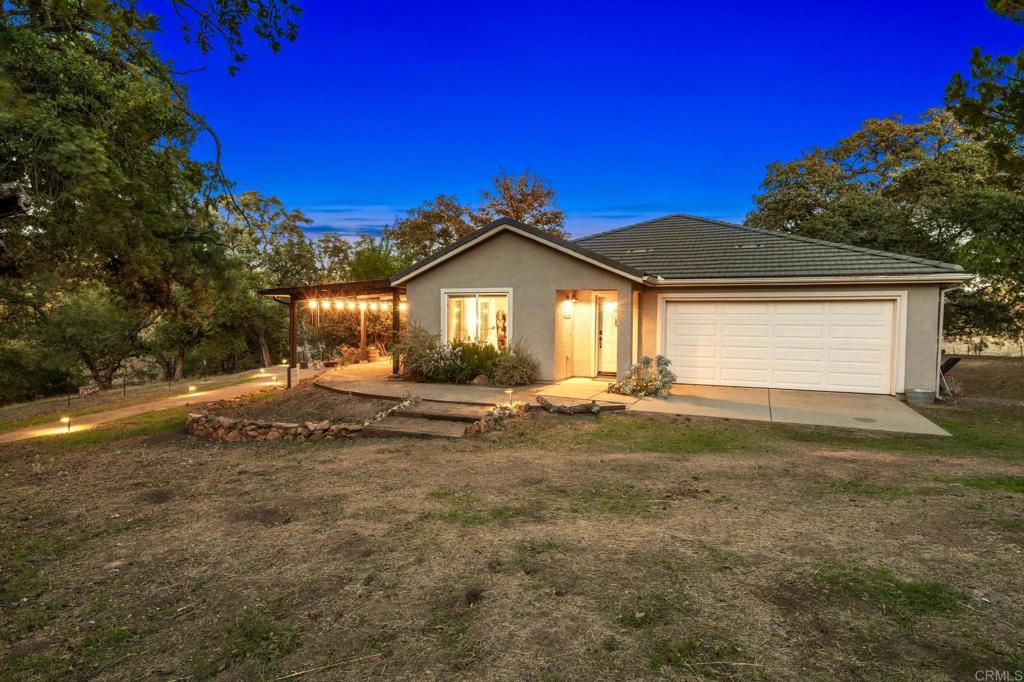 25258 Black Canyon Road Santa Ysabel, CA 92070 - Photo 15 of 71 a view of a house with a yard