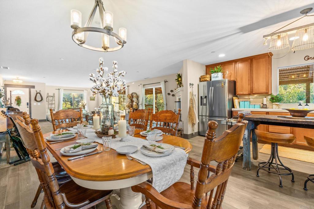 25258 Black Canyon Road Santa Ysabel, CA 92070 - Photo 24 of 69 a view of a dining room with furniture window and outside view