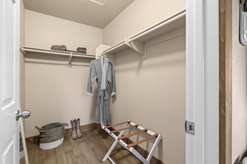 25258 Black Canyon Road Santa Ysabel, CA 92070 - Photo 29 of 69 a bathroom with a granite countertop shower and a sink