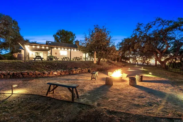 a view of an ocean yard and outdoor seating