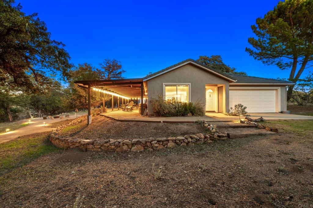 25258 Black Canyon Road Santa Ysabel, CA 92070 - Photo 38 of 71 a front view of a house with a yard