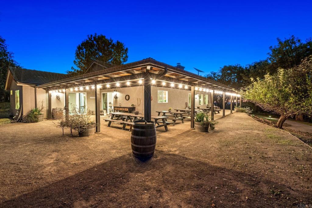 25258 Black Canyon Road Santa Ysabel, CA 92070 - Photo 6 of 71 a view of a chairs and tables in the patio