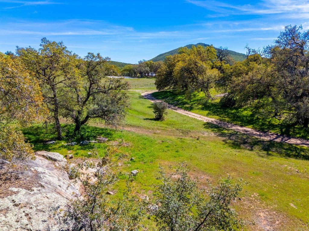 25258 Black Canyon Road Santa Ysabel, CA 92070 - Photo 65 of 71 a view of a lake with a mountain in the background