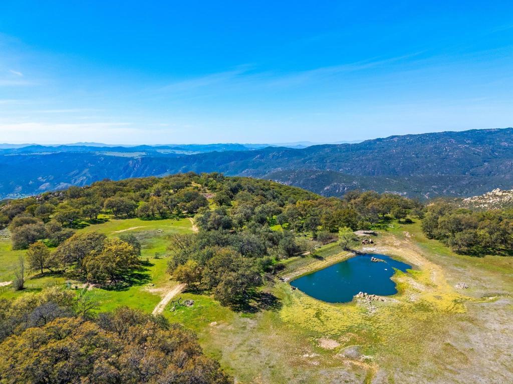 25258 Black Canyon Road Santa Ysabel, CA 92070 - Photo 9 of 71 a view of a lake with mountains in the background