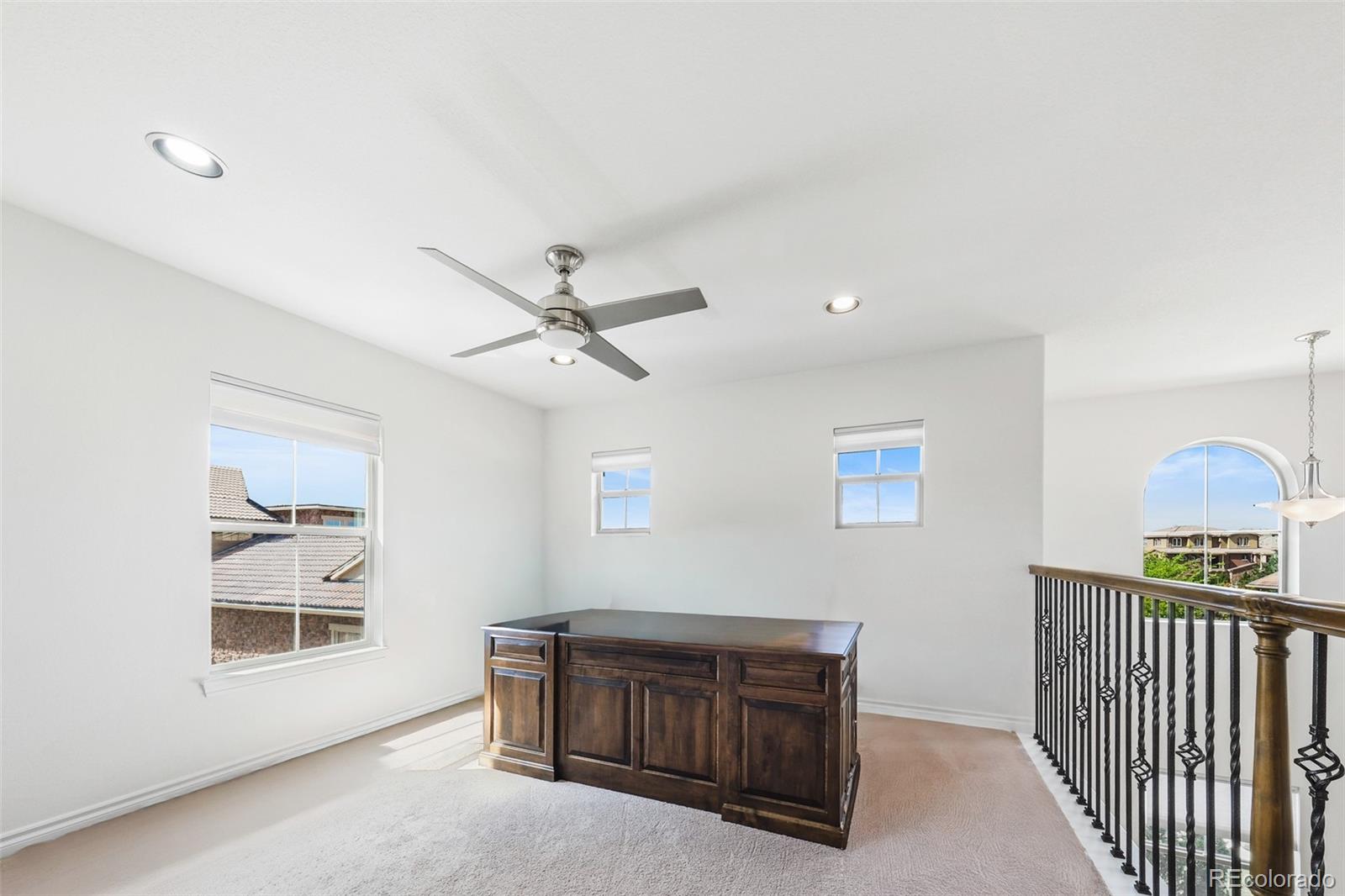 9550 Rosato Court Highlands Ranch, CO 80126 - Photo 18 of 27 a view of an empty room with a window