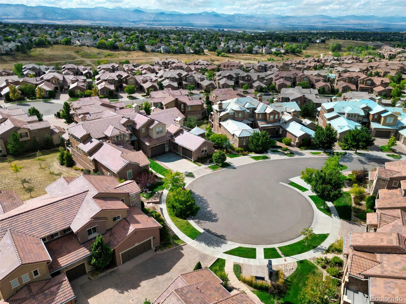 9550 Rosato Court Highlands Ranch, CO 80126 - Photo 2 of 27 an aerial view of residential houses with outdoor space