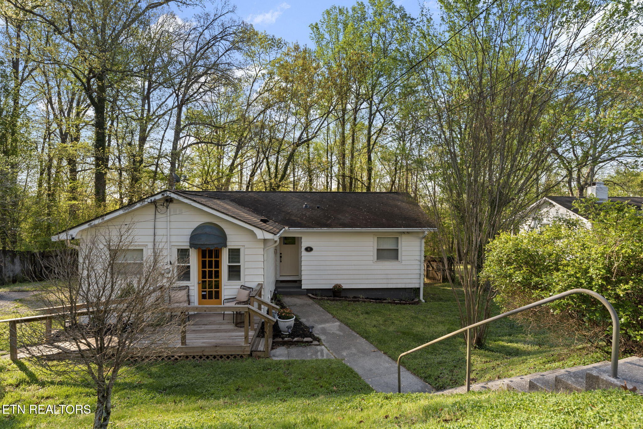 83 Outer Drive Oak Ridge, TN 37830 - Photo 1 of 37 a front view of a house with garden