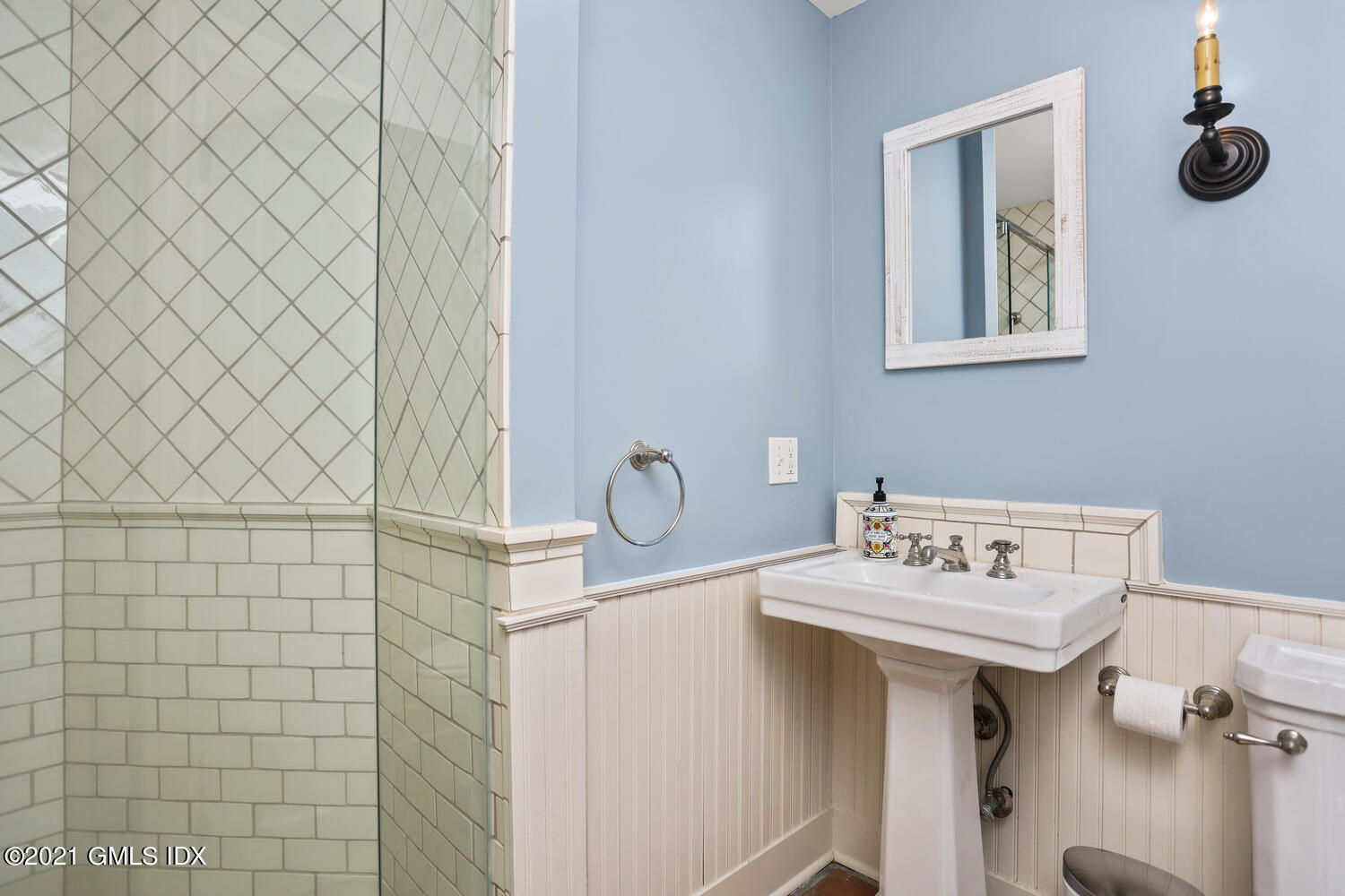 175 Cat Rock Road Cos Cob, CT 06807 - Photo 17 of 72 a bathroom with a sink mirror and toilet