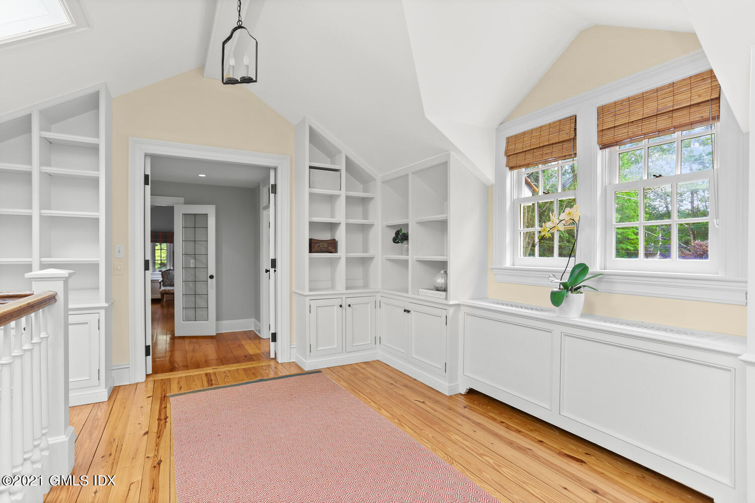 175 Cat Rock Road Cos Cob, CT 06807 - Photo 22 of 72 a spacious bedroom with a bed and a large window with outer view