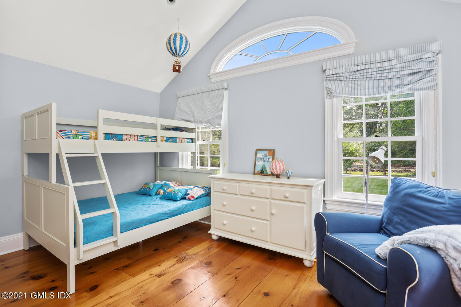 175 Cat Rock Road Cos Cob, CT 06807 - Photo 27 of 72 a bedroom with a bed and a window