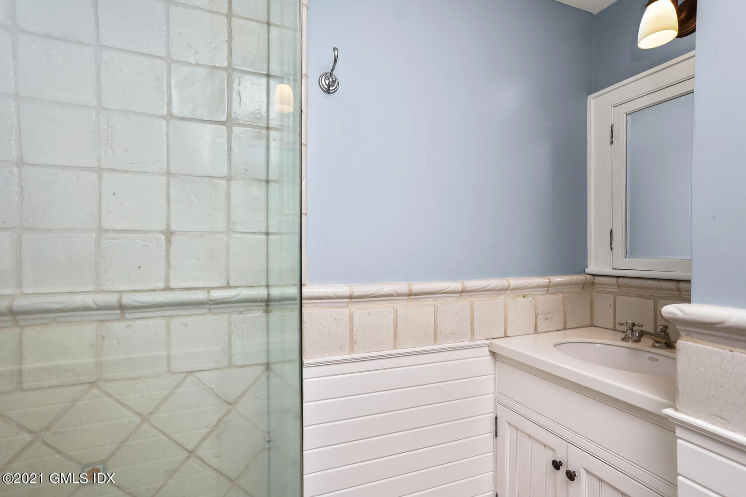 175 Cat Rock Road Cos Cob, CT 06807 - Photo 30 of 72 a bathroom with a sink and vanity