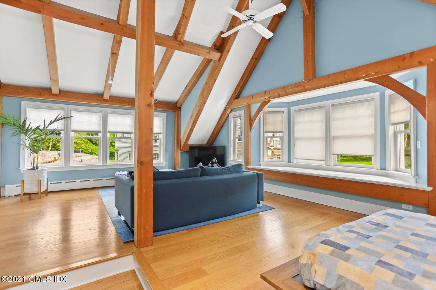175 Cat Rock Road Cos Cob, CT 06807 - Photo 40 of 72 a living room with hardwood floor and a large window