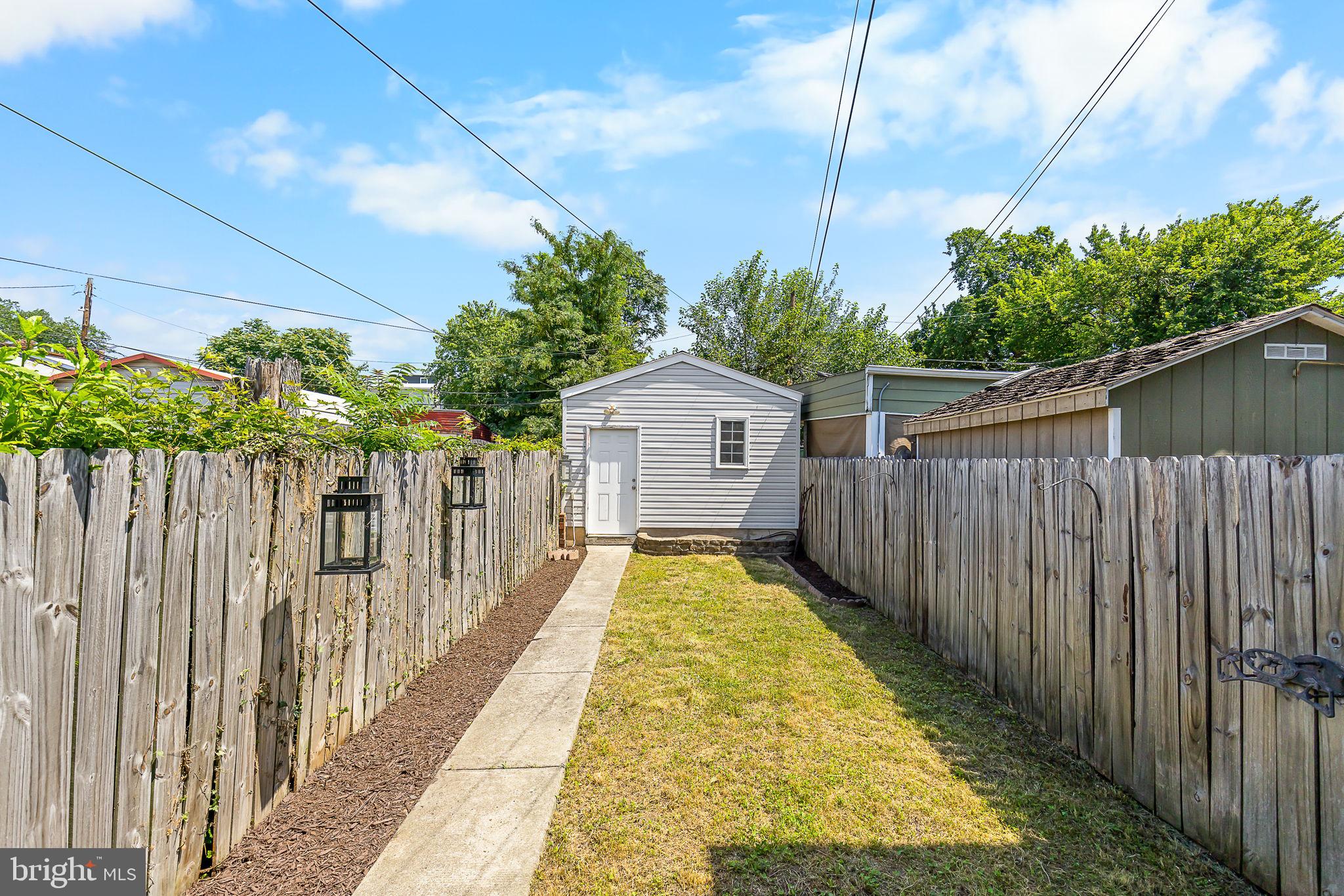 Deck, private backyard, and garage!