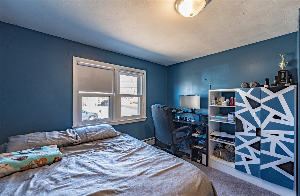241 Mallowhill Road Springfield, MA 01129 - Photo 15 of 34 a bedroom with a bed and a window