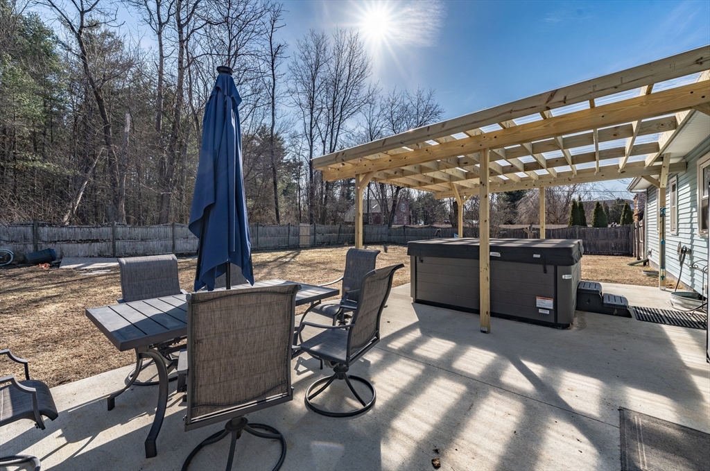 241 Mallowhill Road Springfield, MA 01129 - Photo 26 of 34 a view of a patio with a table and chairs