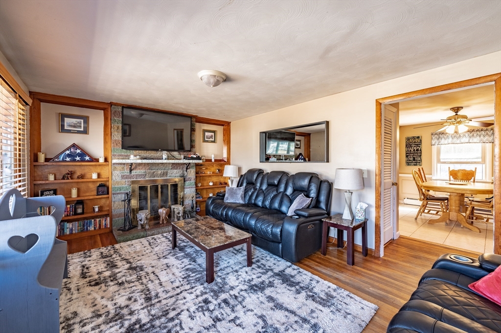 241 Mallowhill Road Springfield, MA 01129 - Photo 5 of 34 a living room with furniture and a flat screen tv
