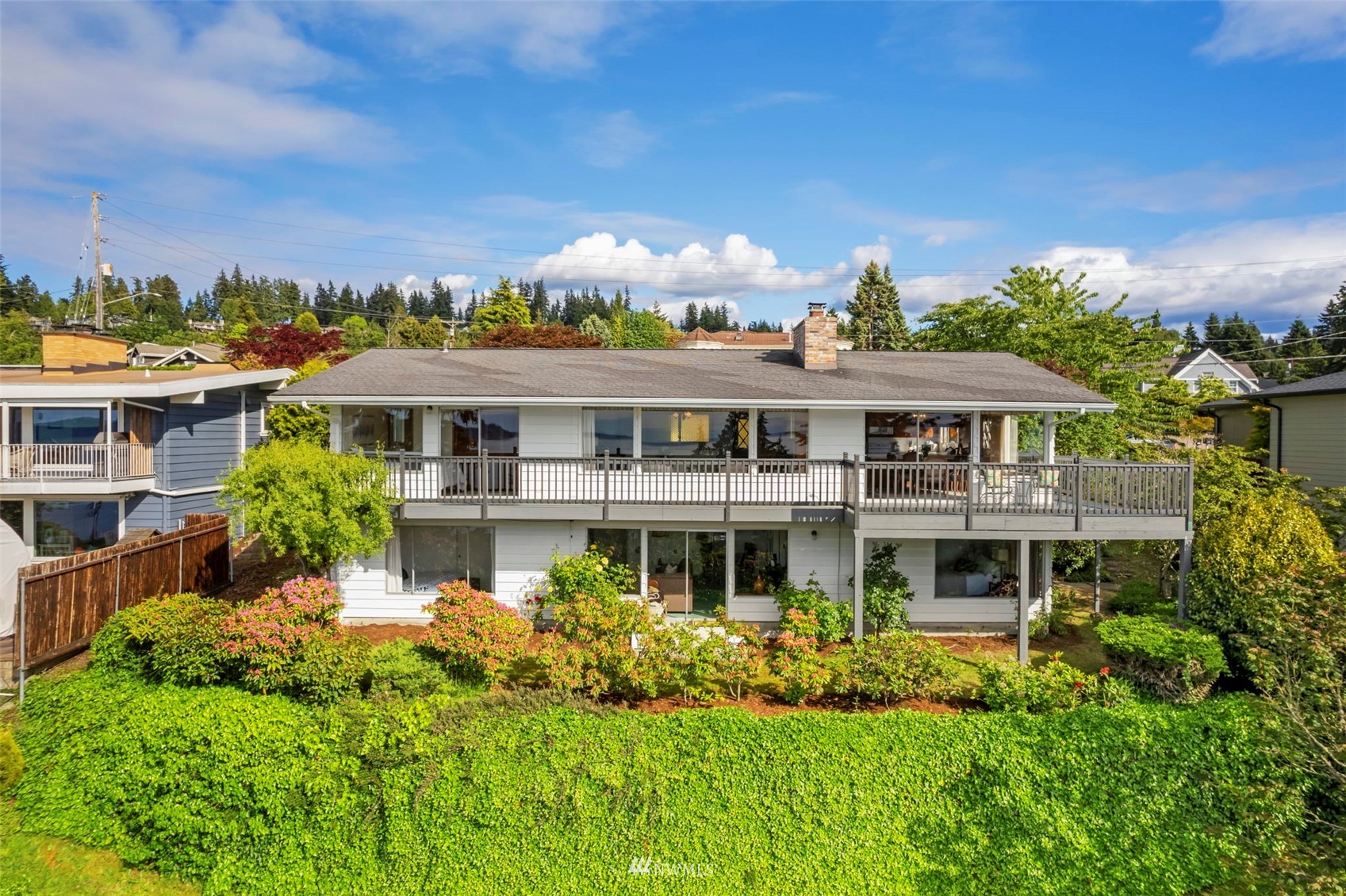 17122 Talbot Road Edmonds, WA 98026 - Photo 3 of 34 a front view of a house with a yard
