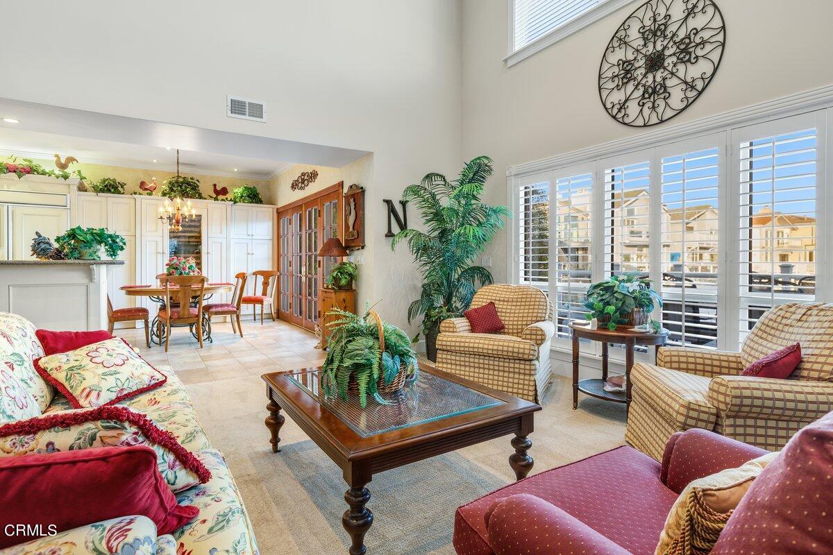 2300 Peninsula Road Oxnard, CA 93035 - Photo 11 of 54 a living room with furniture and a large window