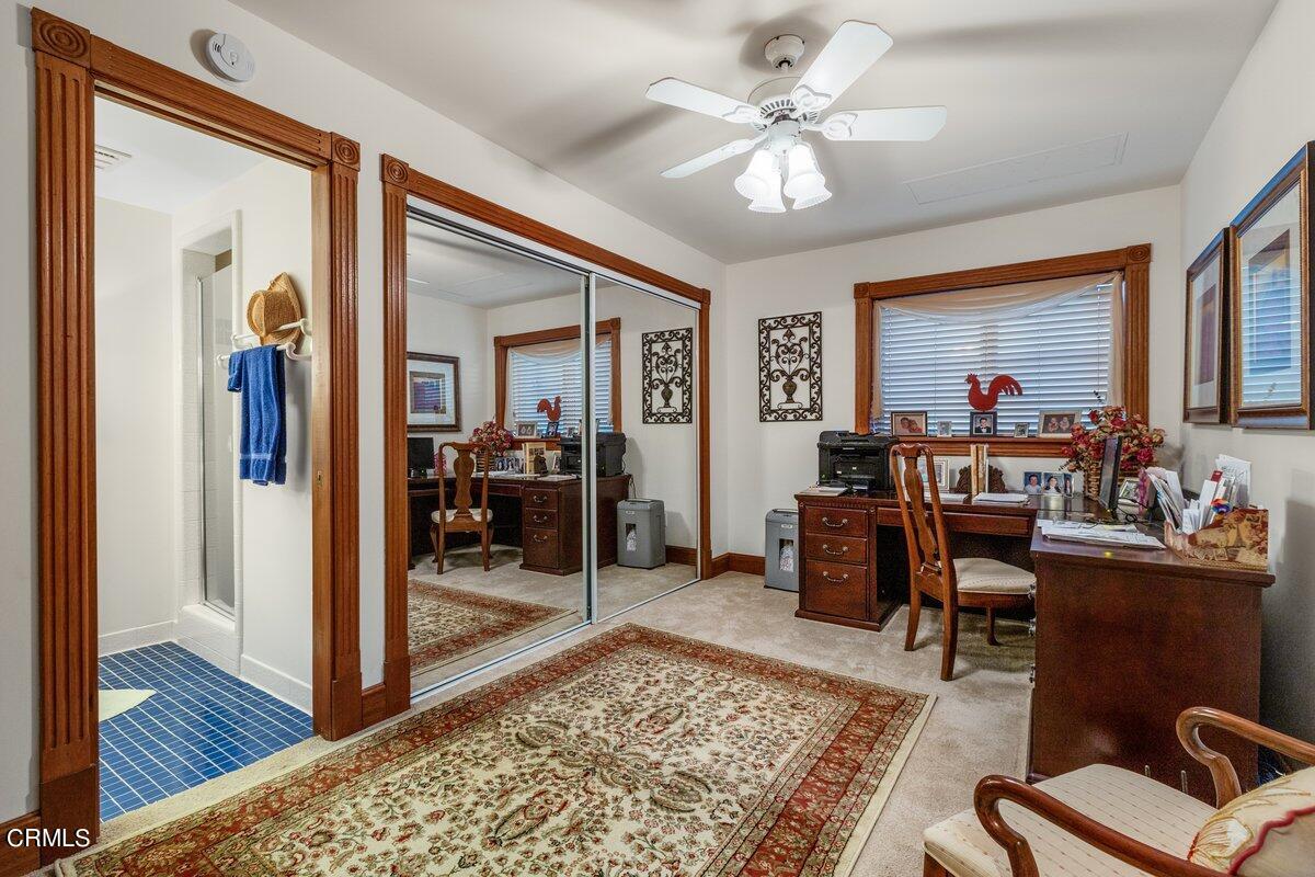 2300 Peninsula Road Oxnard, CA 93035 - Photo 22 of 54 a living room with furniture and a rug