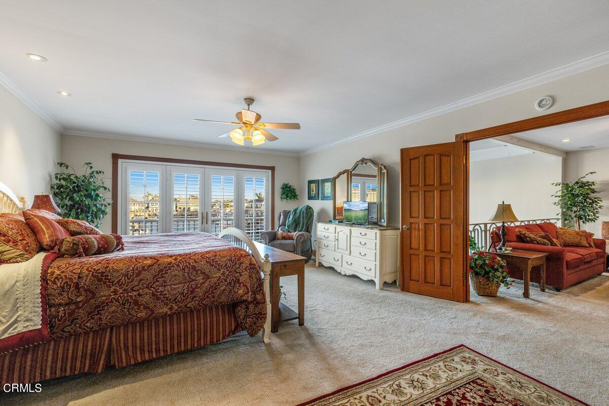 2300 Peninsula Road Oxnard, CA 93035 - Photo 35 of 54 a bedroom with furniture and a window