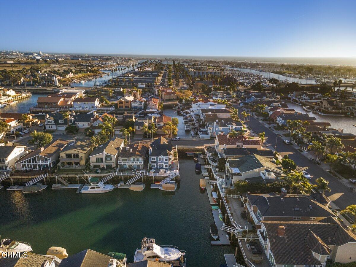 2300 Peninsula Road Oxnard, CA 93035 - Photo 49 of 54 an aerial view of a city with lots of residential buildings lake and ocean view