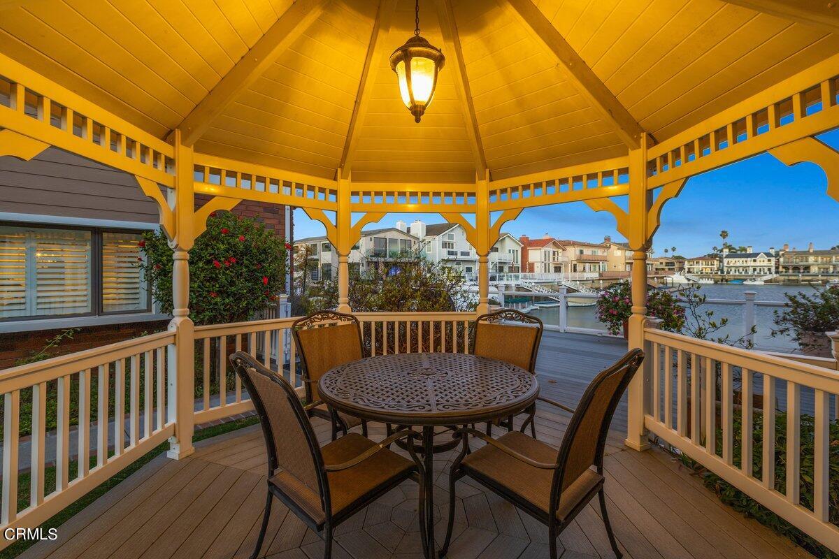 2300 Peninsula Road Oxnard, CA 93035 - Photo 7 of 54 a view of a chairs and table in the balcony