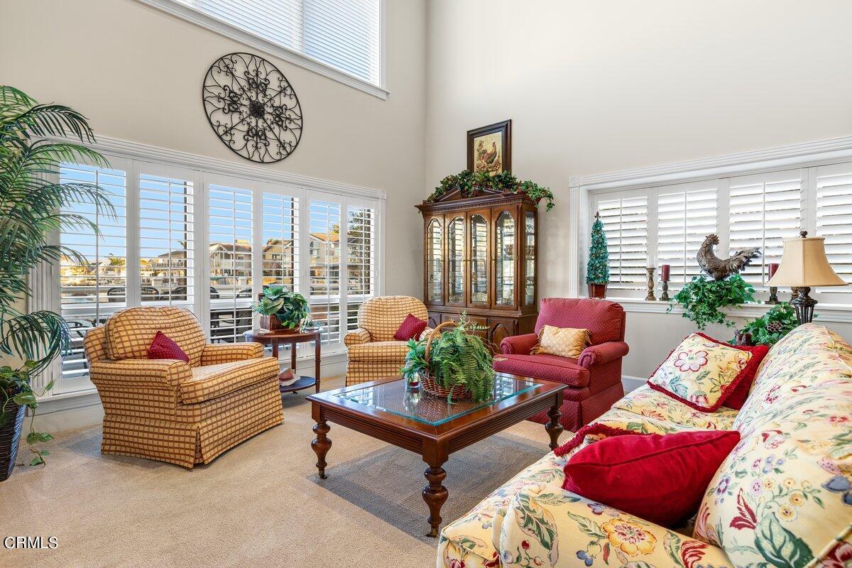 2300 Peninsula Road Oxnard, CA 93035 - Photo 10 of 54 a living room with furniture and a large window