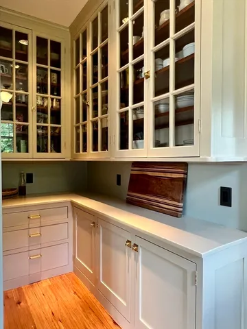 a kitchen with a sink and a window