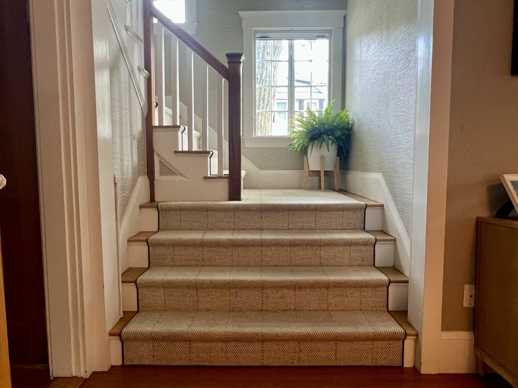 211 Forest Street Winchester, MA 01890 - Photo 18 of 41 a view of entryway and hall with wooden floor