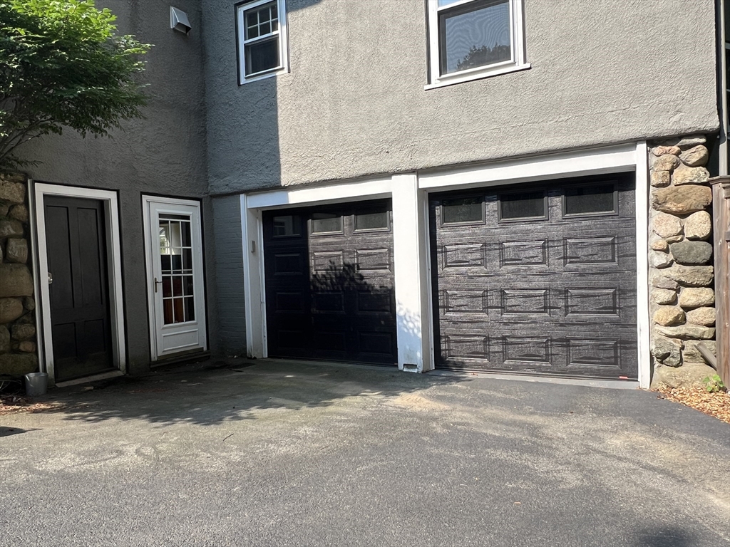 211 Forest Street Winchester, MA 01890 - Photo 41 of 41 an empty room with fireplace