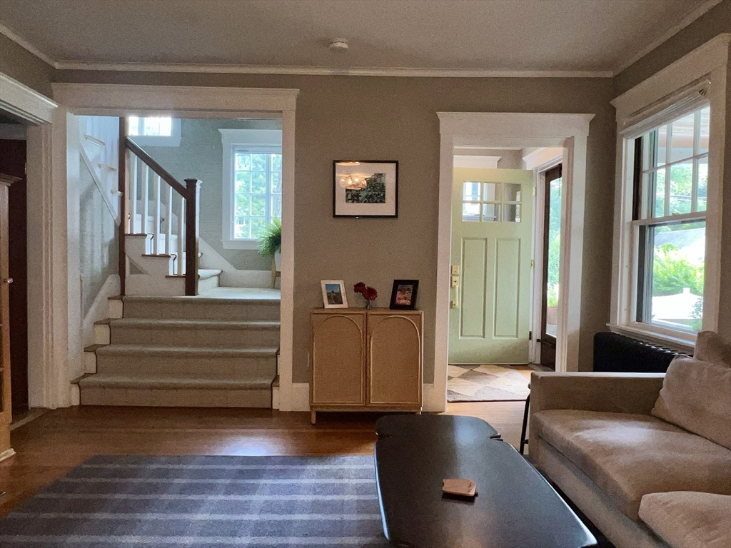 211 Forest Street Winchester, MA 01890 - Photo 5 of 41 a living room with furniture and a large window