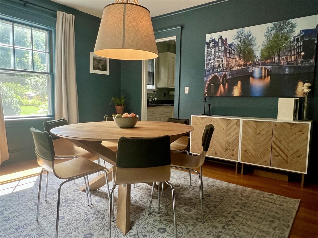 211 Forest Street Winchester, MA 01890 - Photo 10 of 41 a view of a dining room with furniture and wooden floor