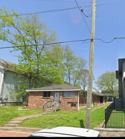 a view front of house with a yard