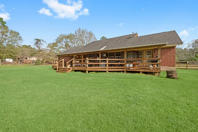 a view of a house with a big yard