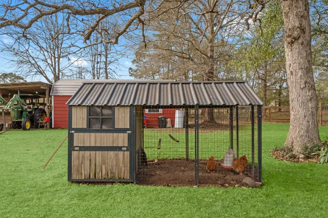 a view of backyard with green space