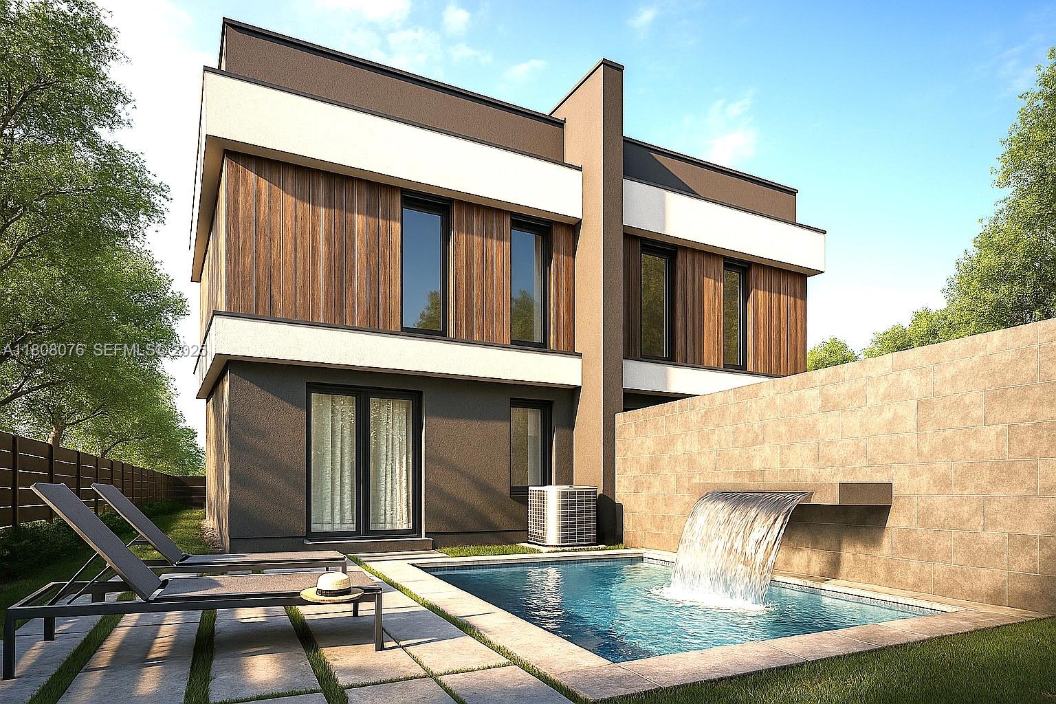 1153 Southwest 22nd Terrace Miami, FL 33129 - Photo 2 of 7 a front view of a house with entertaining space