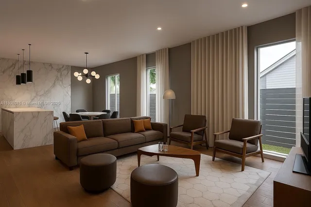 a living room with furniture and a chandelier