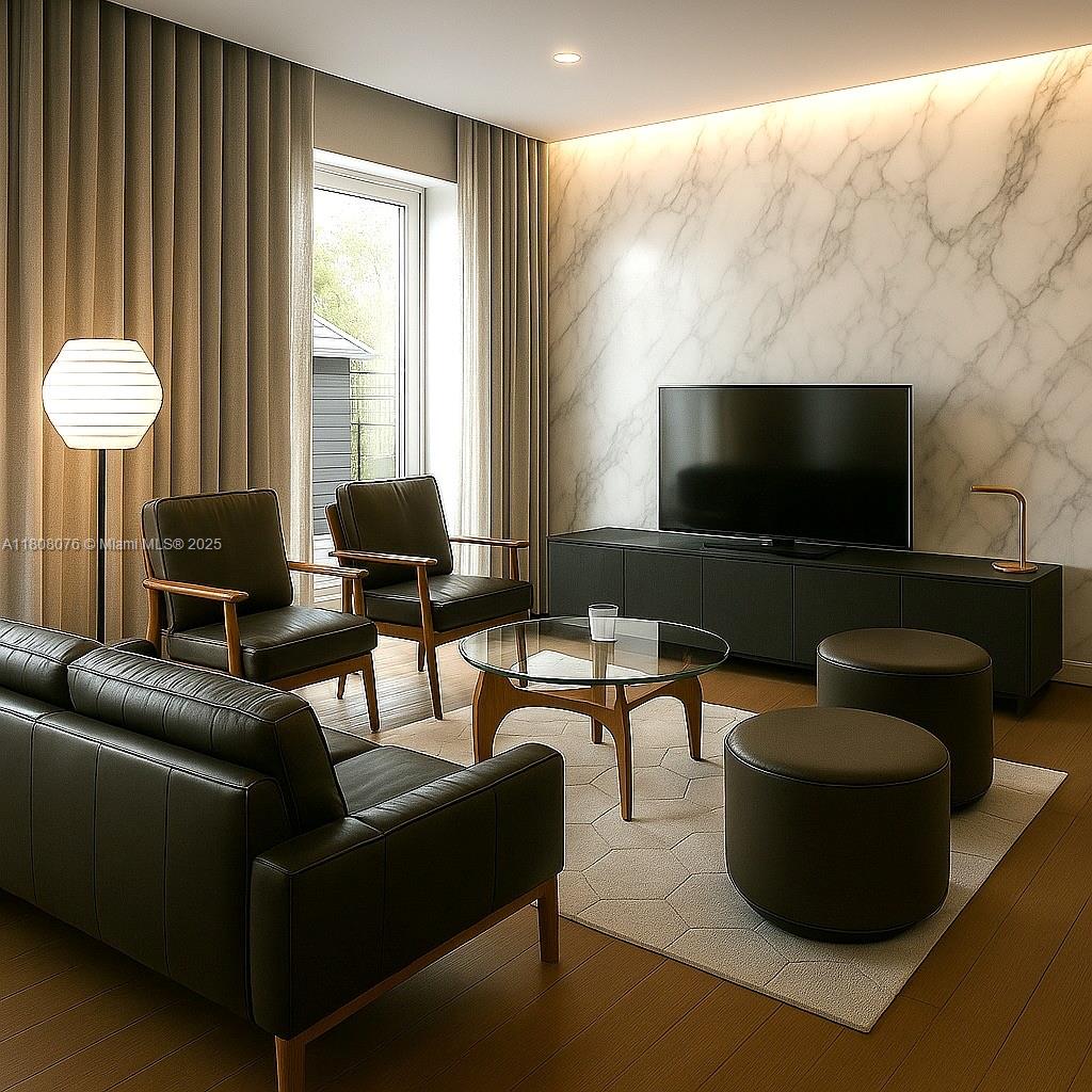 1153 Southwest 22nd Terrace Miami, FL 33129 - Photo 5 of 7 a living room with furniture and a flat screen tv