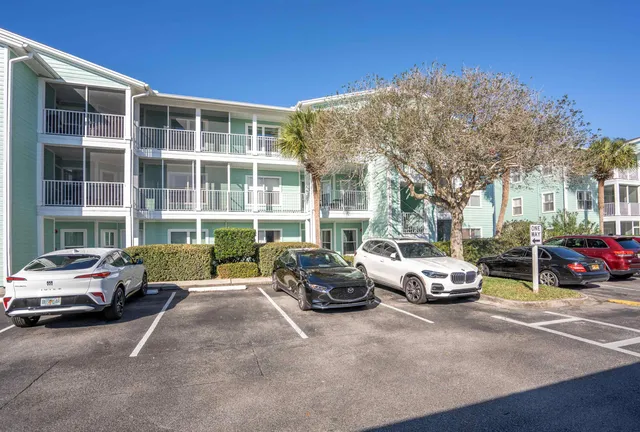 an aerial view of a house with garden space