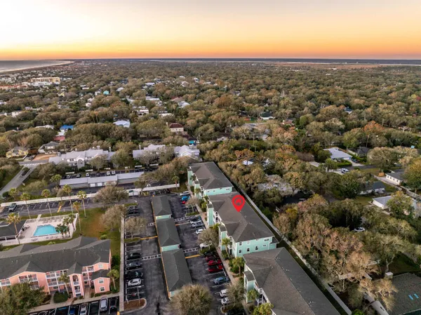 an aerial view of a city with lots of residential buildings