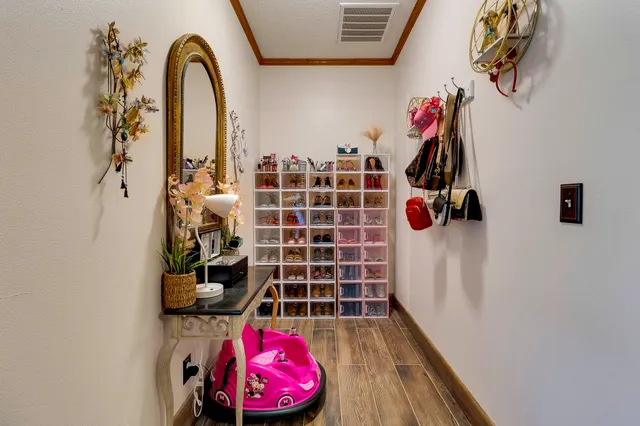 a bathroom with a sink vanity mirror and toilet