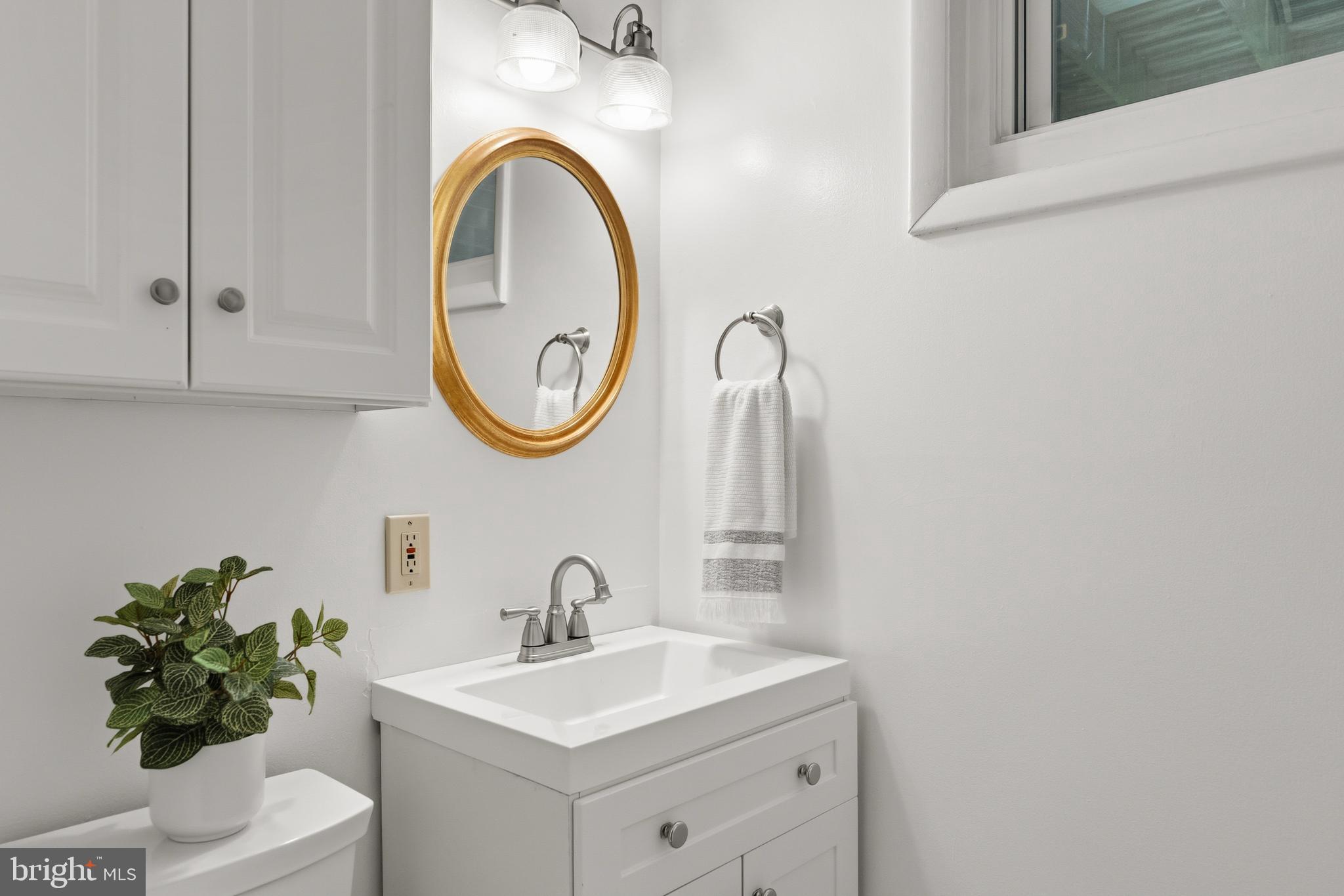 8719 Gateshead Road Alexandria, VA 22309 - Photo 35 of 53 Half bath recently retiled