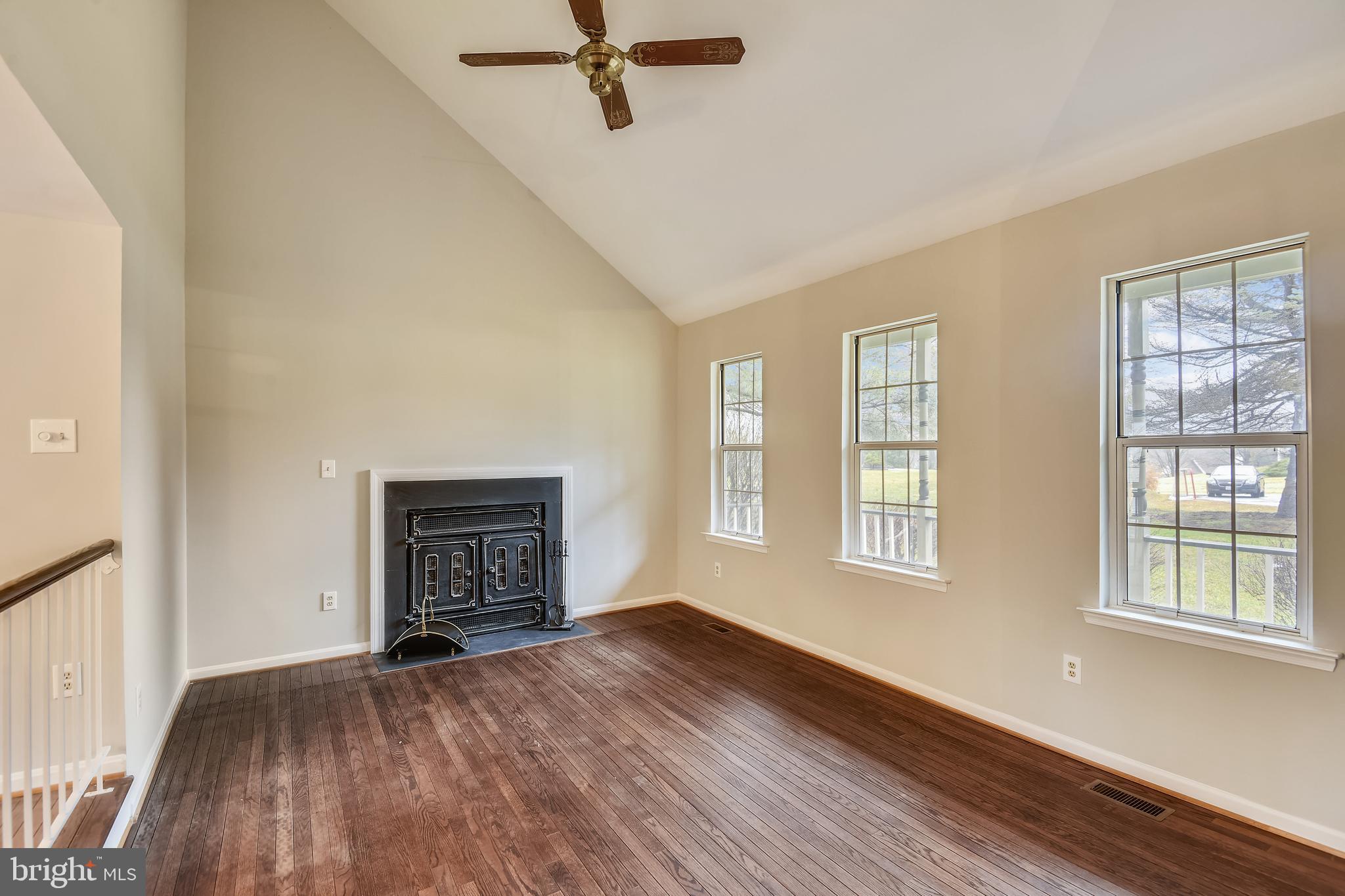 11052 Bishopsgate Court Reston, VA 20194 - Photo 6 of 32 Living room with wood burning fireplace