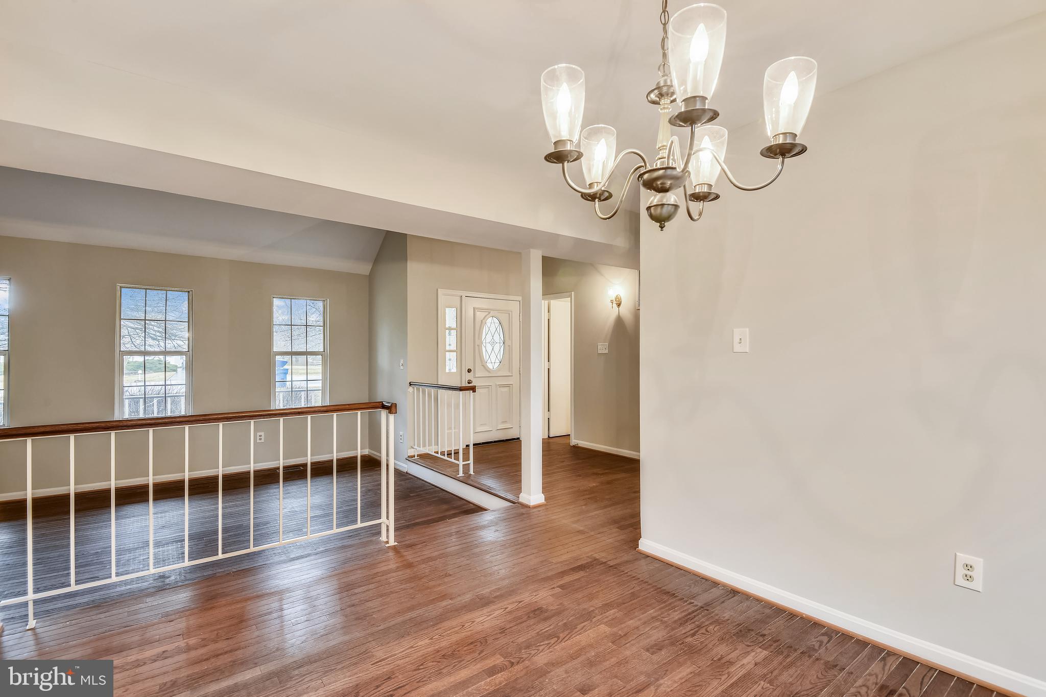 11052 Bishopsgate Court Reston, VA 20194 - Photo 9 of 32 Dining Room to living room and foyer