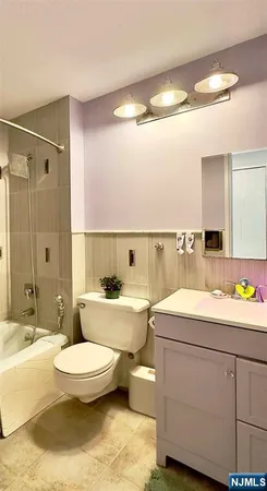 a view of bathroom with a sink mirror toilet and bathtub