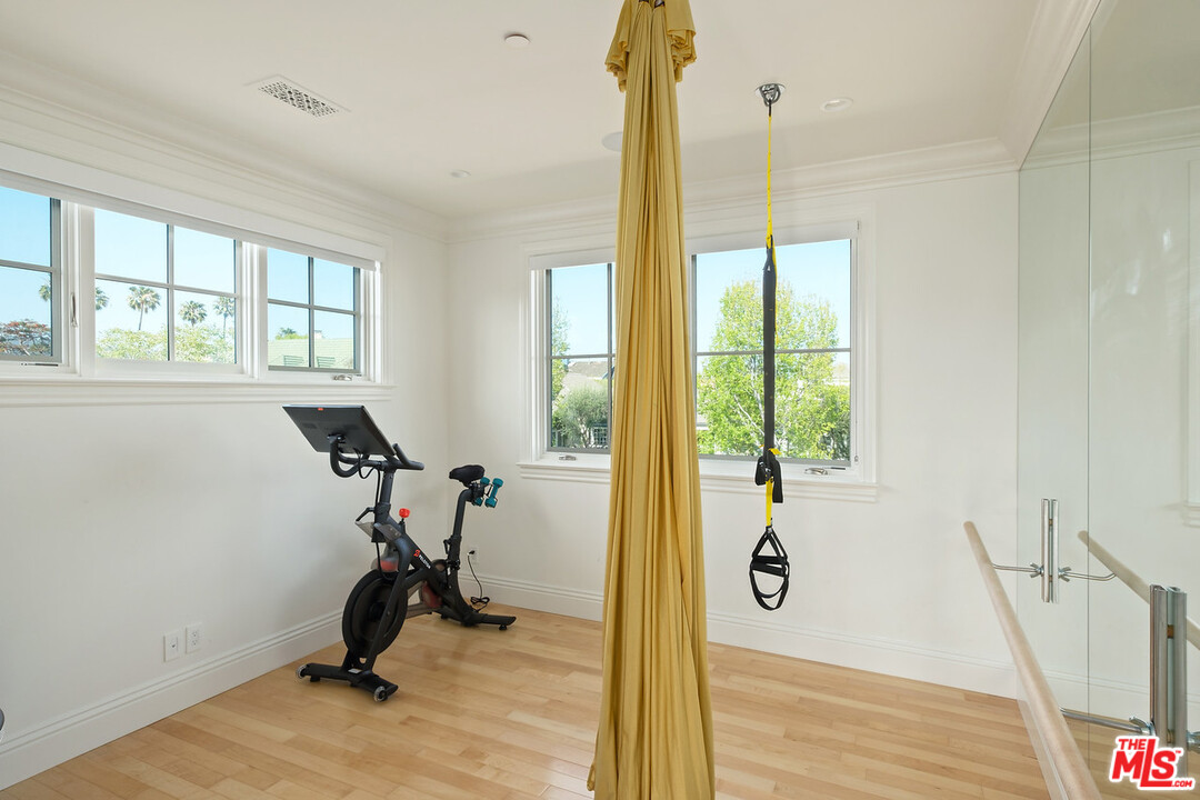 557 Chapala Drive Pacific Palisades, CA 90272 - Photo 35 of 48 a view of a room with gym equipment