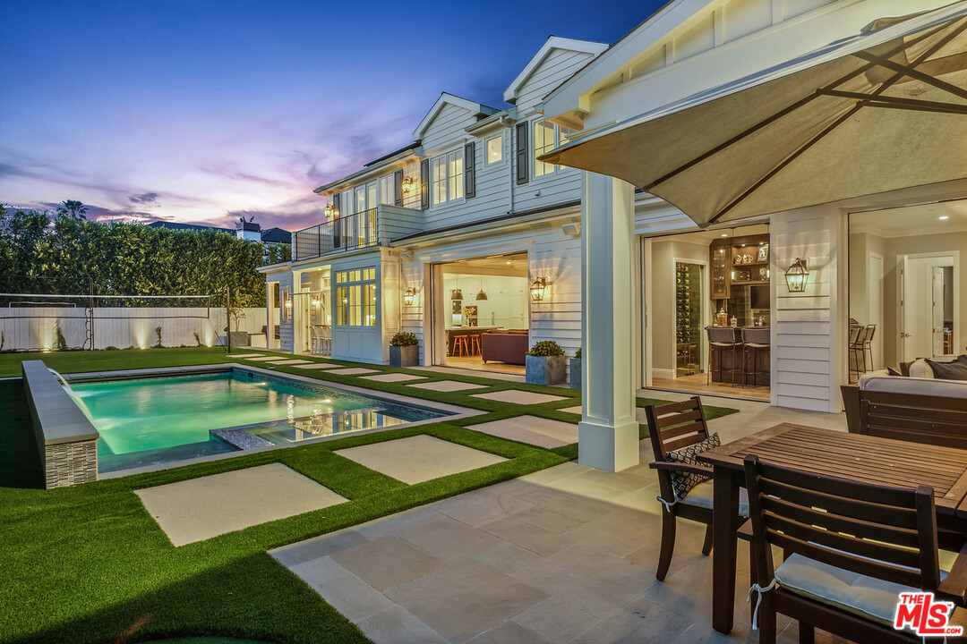 557 Chapala Drive Pacific Palisades, CA 90272 - Photo 47 of 48 a view of a house with a backyard