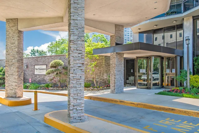 a front view of a house with a porch